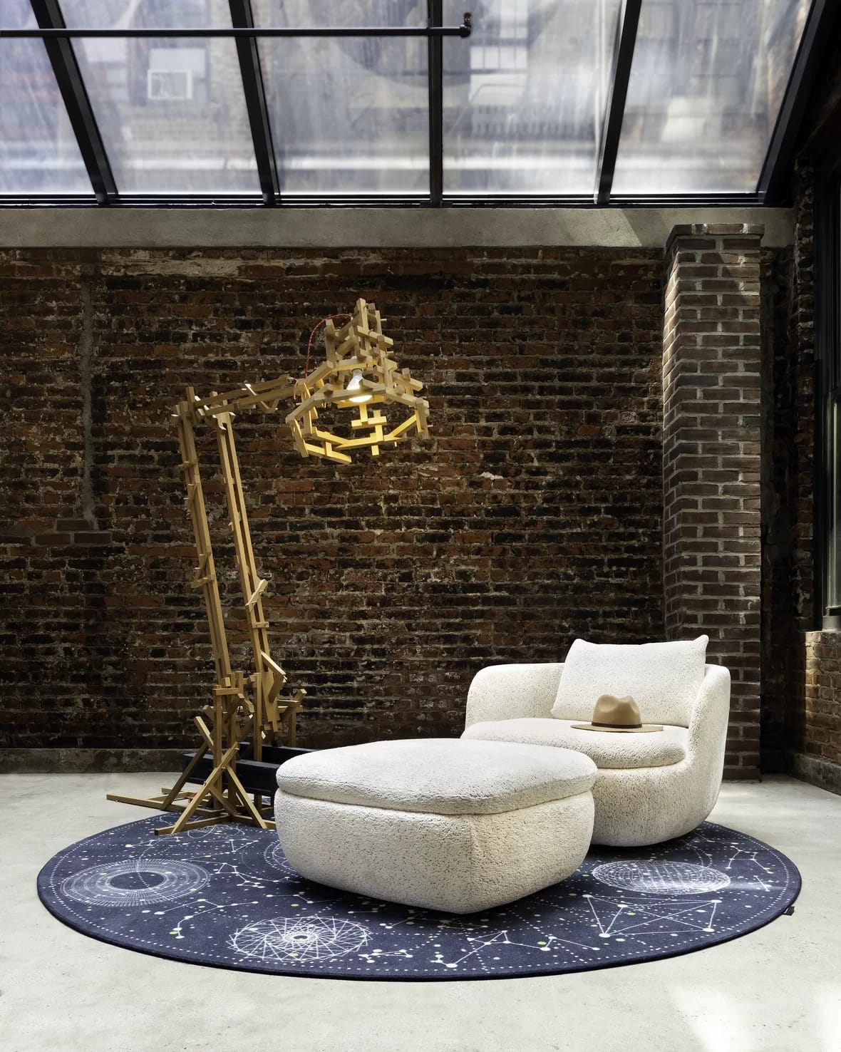 Bart armchair and footstool set in Extinct animals fabric of the Dodo Pavone at our brand store in New York