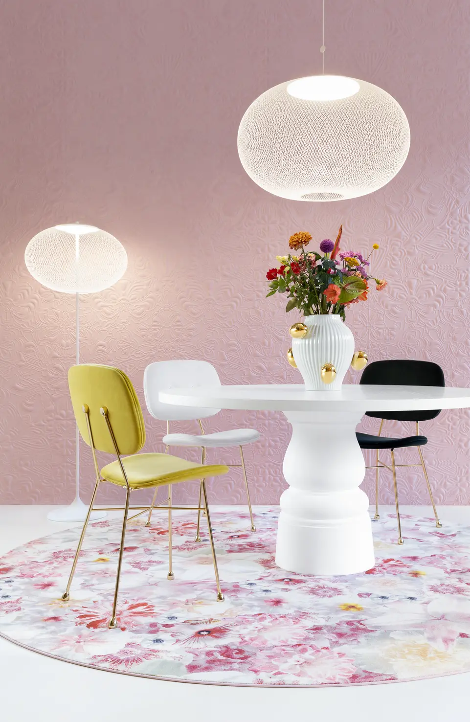 Flowergarden carpet in setting with golden chairs and container table and moooi wallcovering