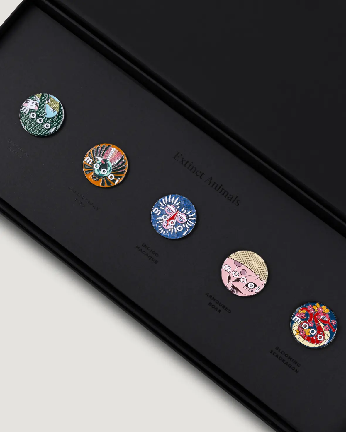 Extinct Animal Pins in box detail